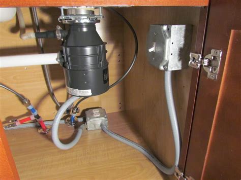 under sink cabinet electrical box